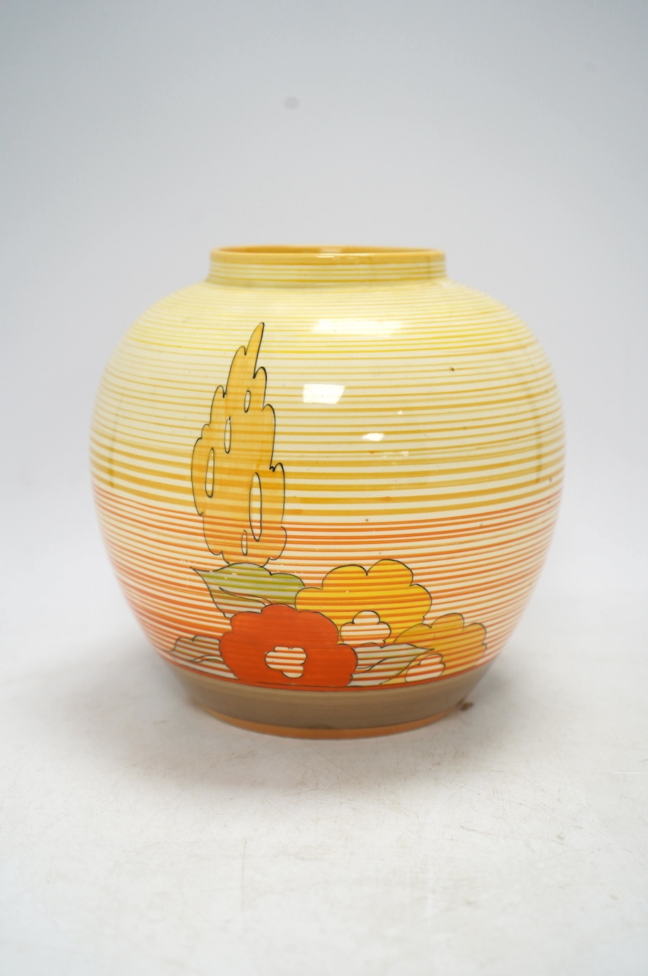 A Clarice Cliff Bizarre vase, Capri pattern,17cm high. Condition - fair to good